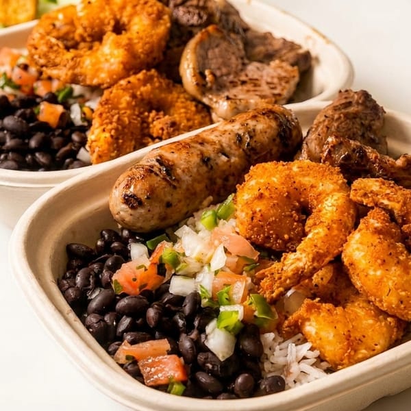 Two takeout containers filled with rice, black beans, fried shrimp, sausage, and grilled meat.